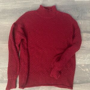 Mock neck sweater.